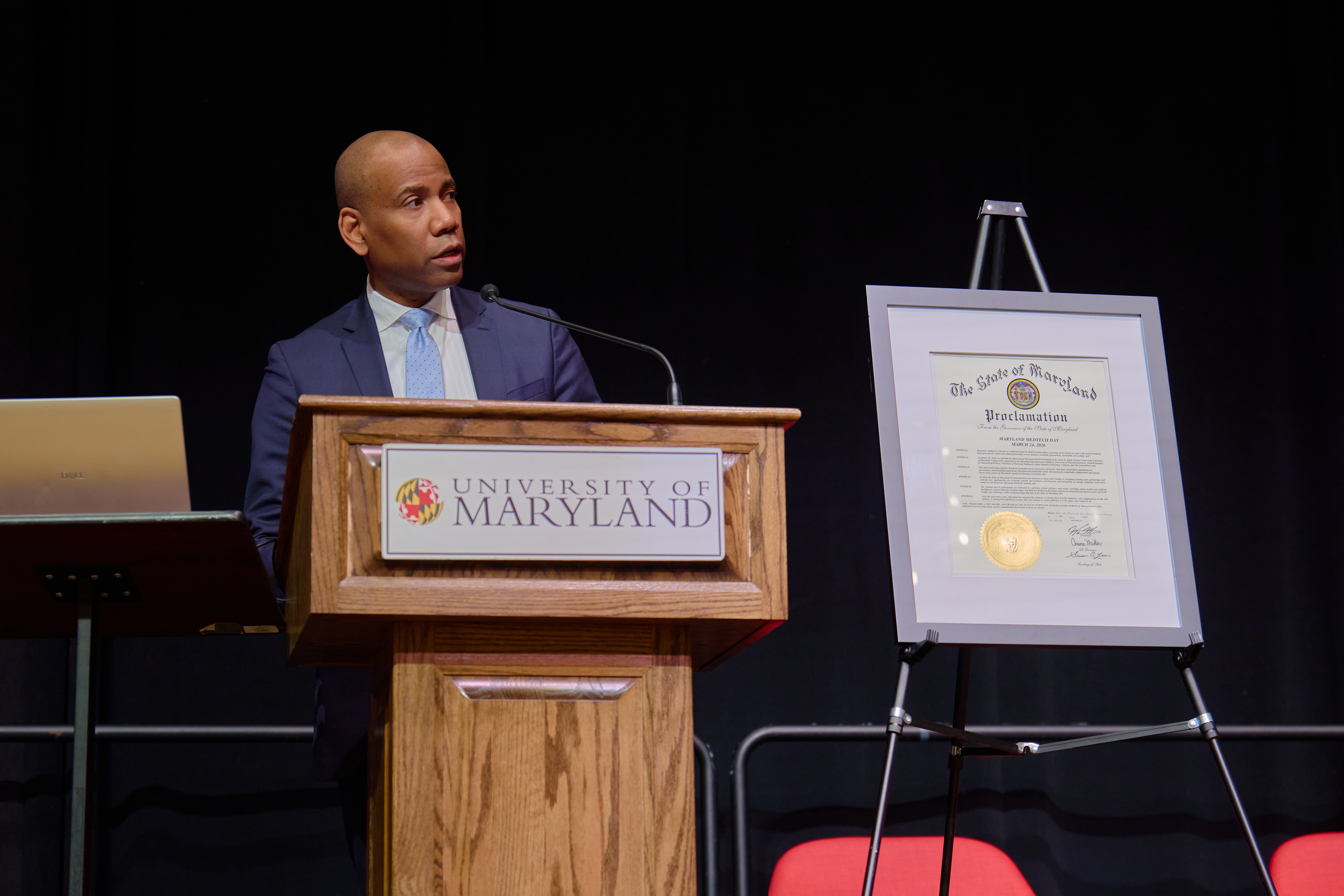 Deputy Secretary Ricardo Benn presents the Governor's Procolamation.